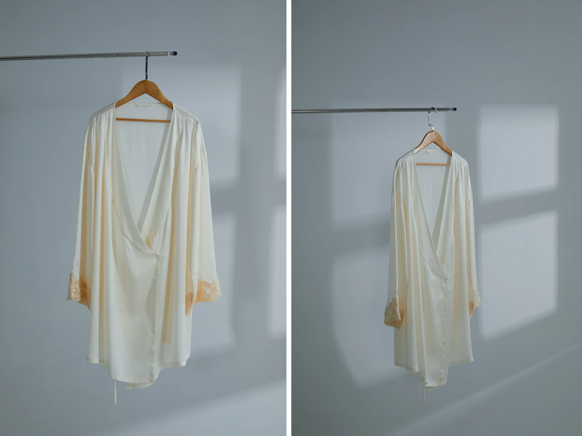 Still-life photography of a cream silk robe, using hanging displays, chair styling, and cast light to convey drape and lace detail.