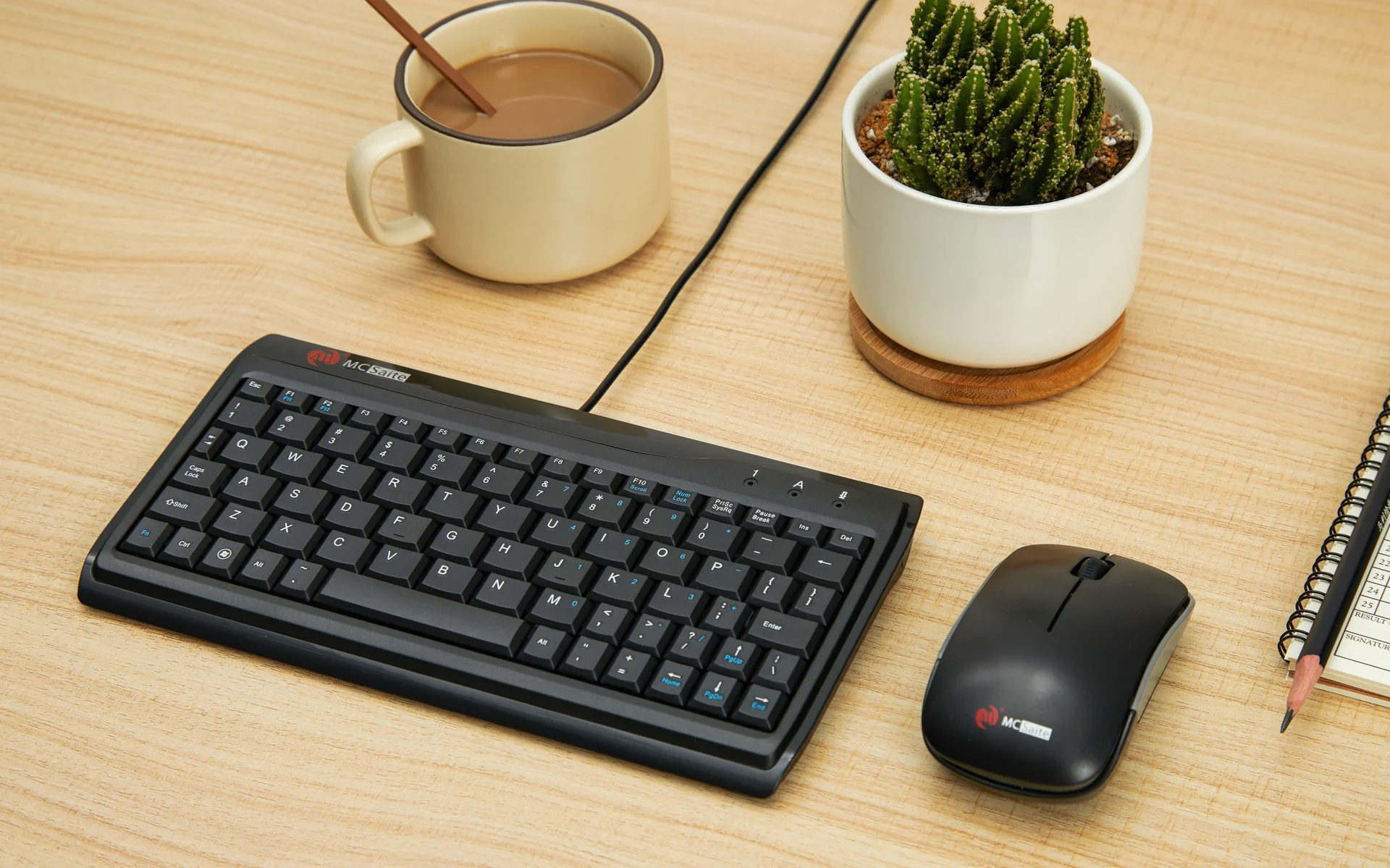 Desk-scene photography for the MCSaite keyboard and mouse set, built across a white minimal desk and a warm wooden one.